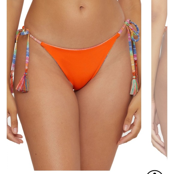 Selling this swimsuit. Never worn. Size Medium top and bottom. Reversible. - Picture 5 of 6
